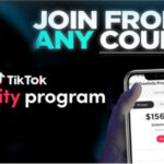 Creator checking TikTok Creativity Program Beta earnings dashboard on a smartphone